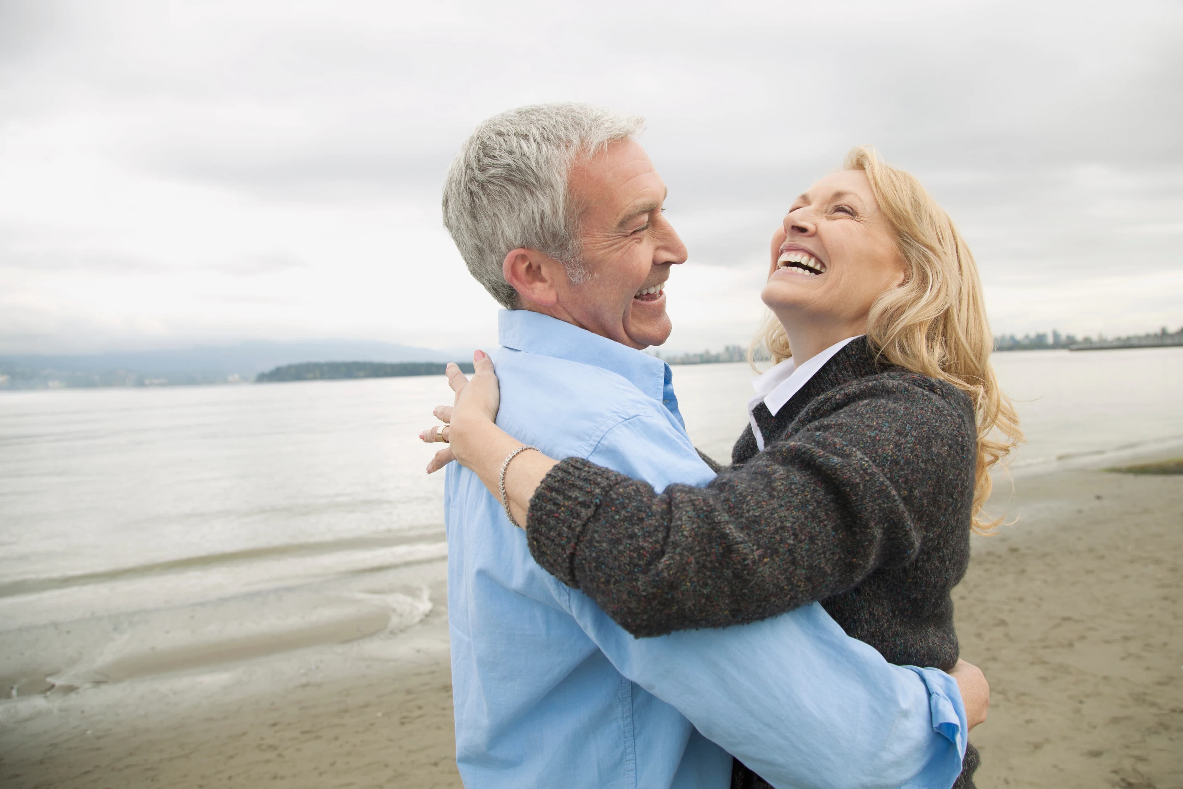 Mature couple smiling confidently