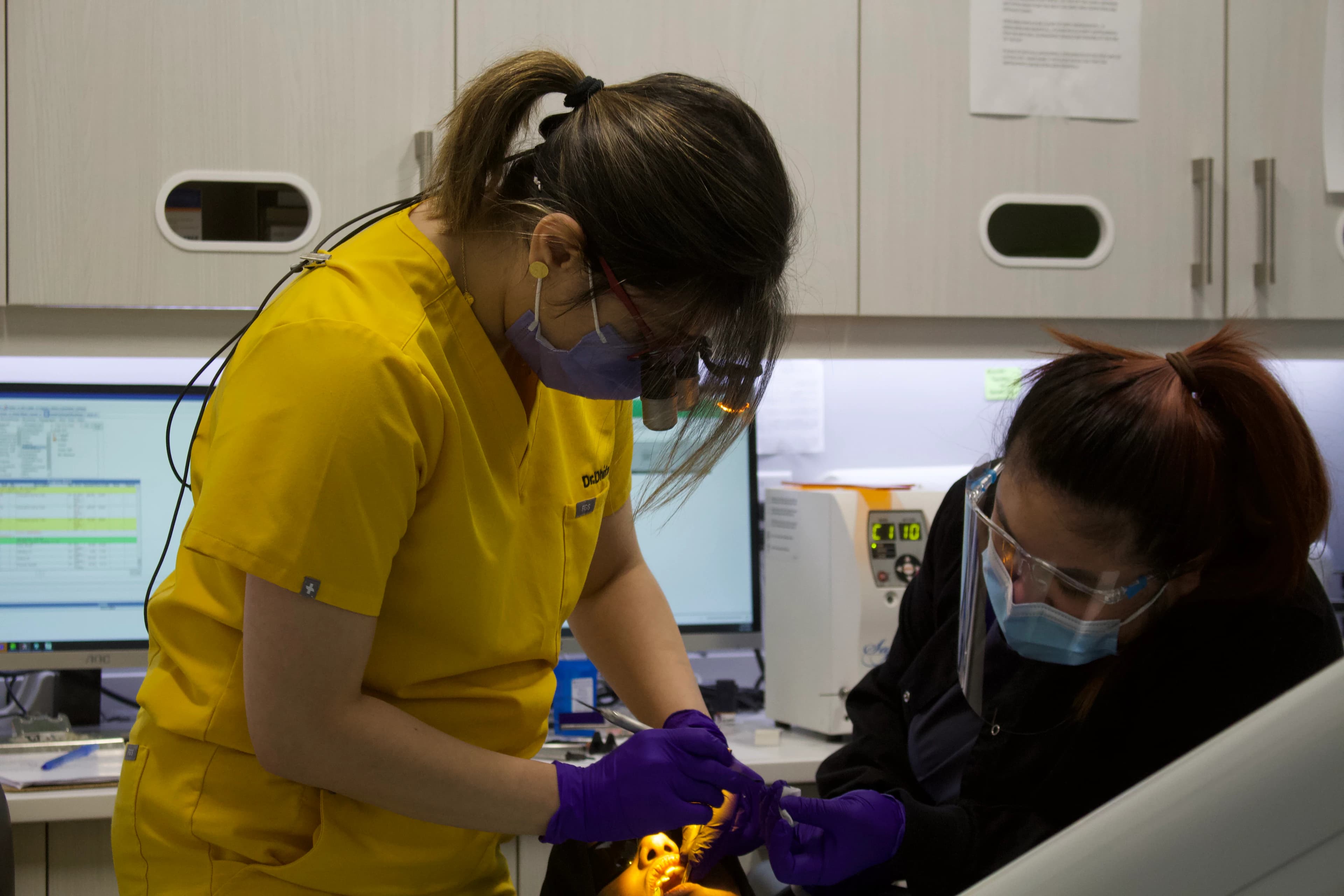 Bal Dental Centre dentist and assistant treating a patient in Scarborough