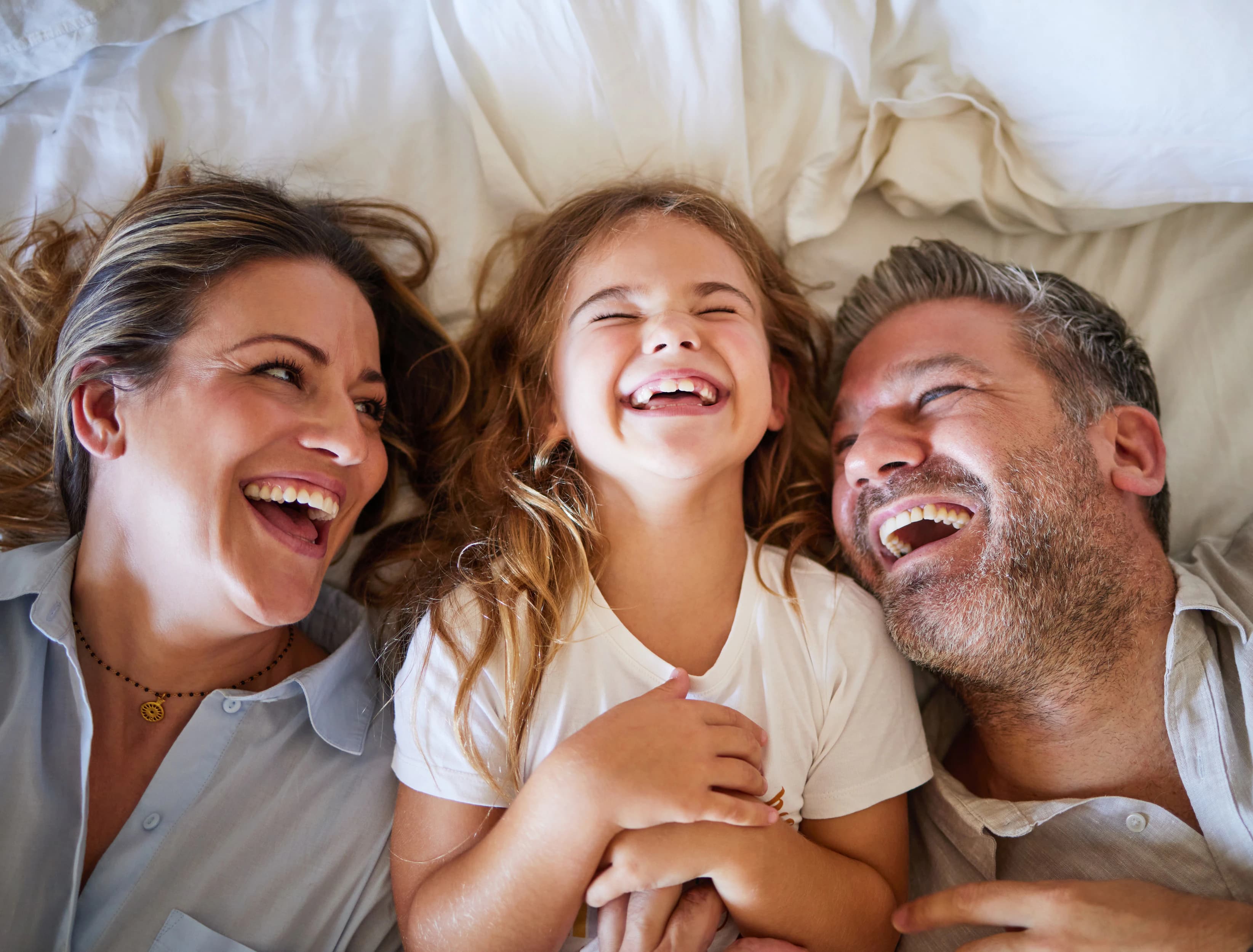 Happy family laughing together